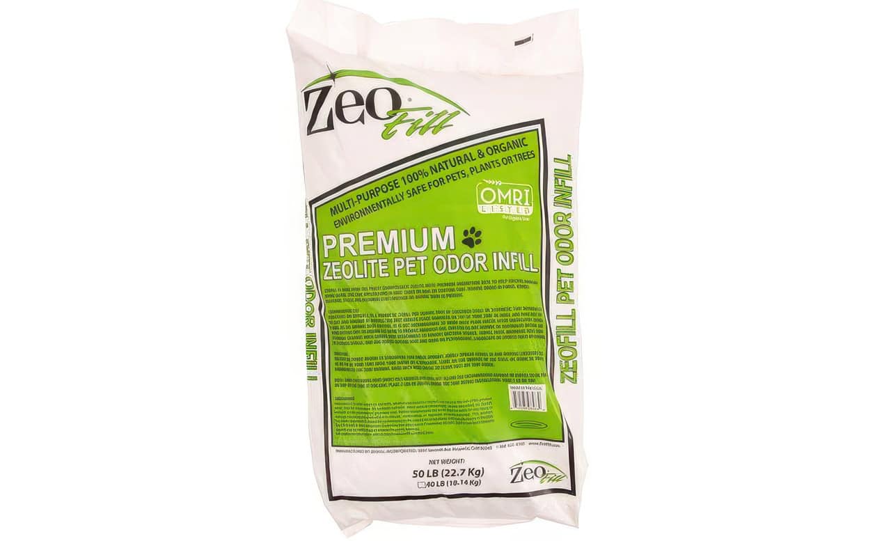 White bag labeled “ZeoFill Premium Zeolite Pet Odor Infill” used for reducing odors in artificial turf.