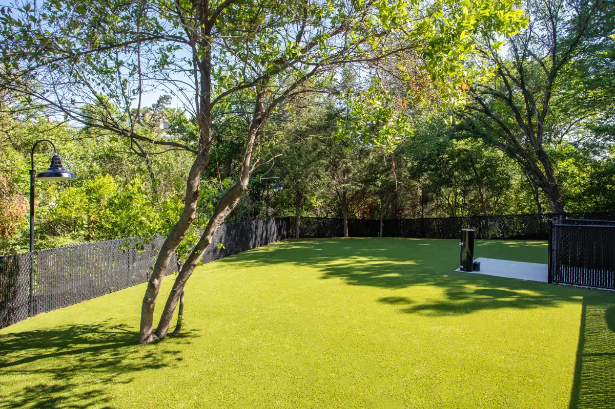 Artificial Grass Dog Park with trees and water fountains for an apartment complex