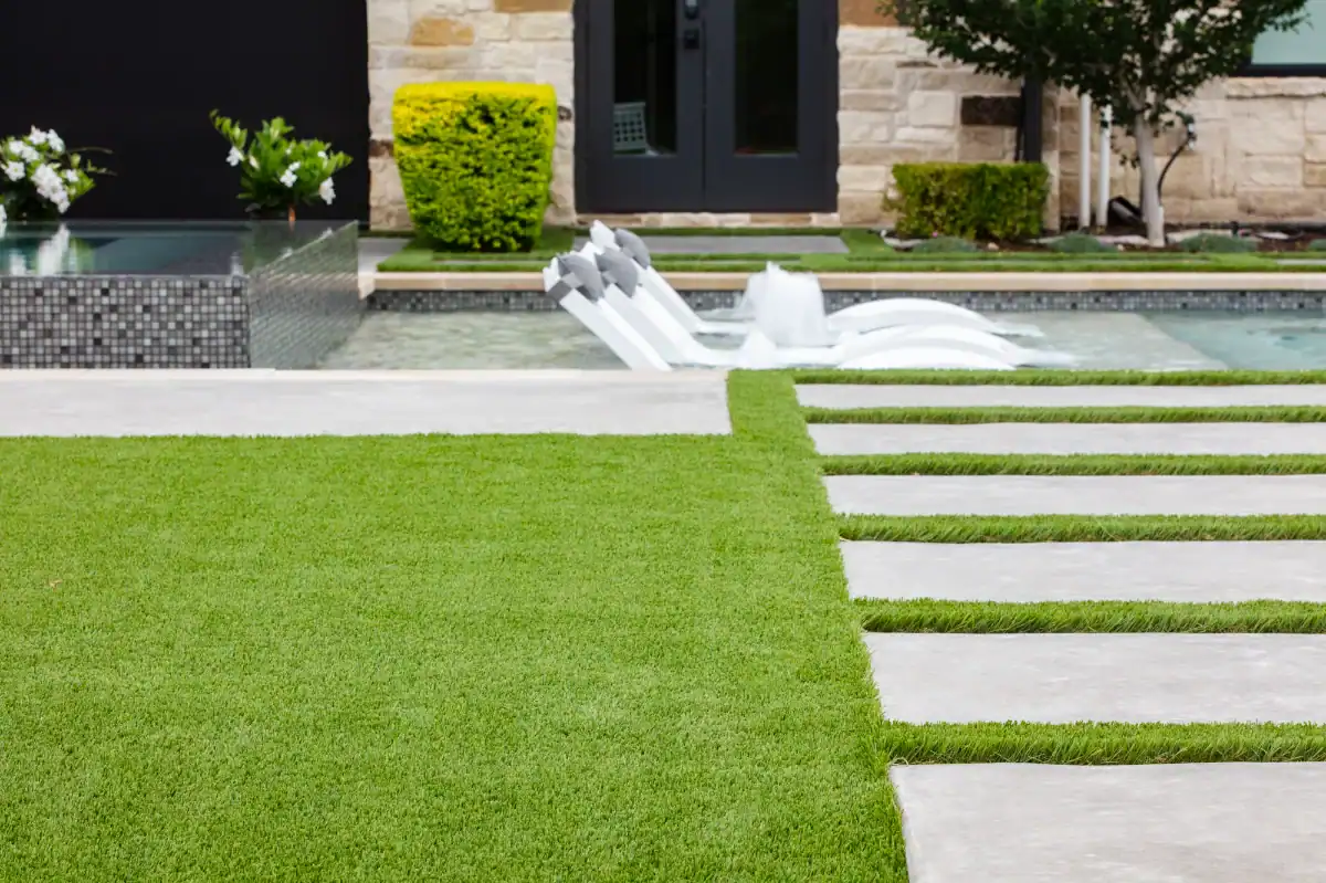 Synthetic Grass Strips in Prosper next to a swimming pool