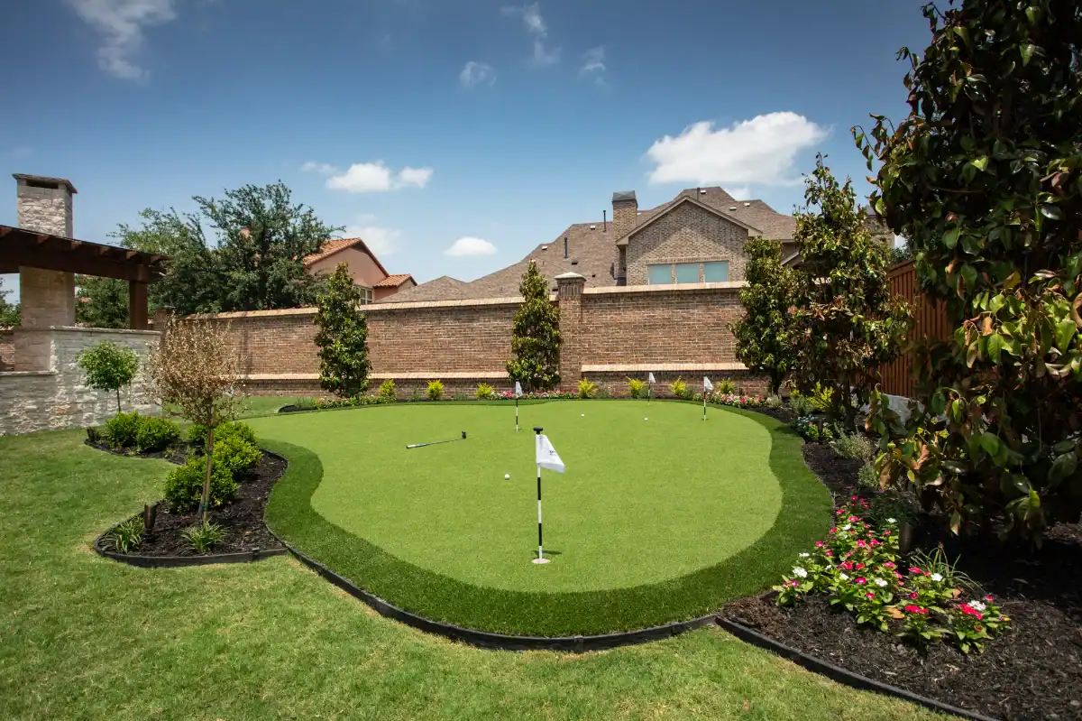 Southlake Putting Green Southlake Putting Green with artificial turf and flower beds