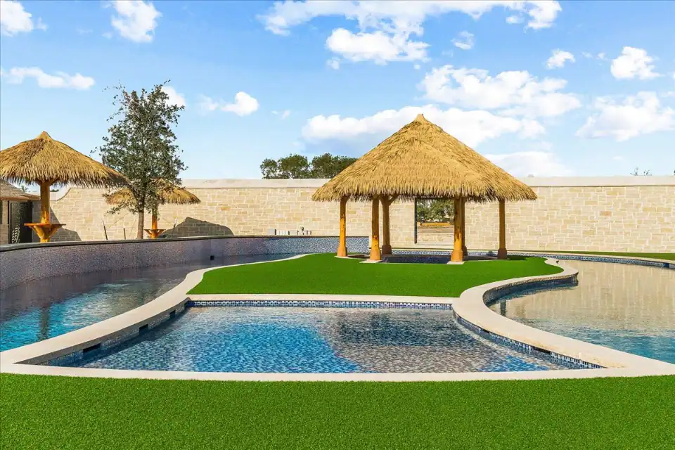 Synthetic Turf Yard in Southlake Synthetic Turf Yard in Southlake surrounded by a pool