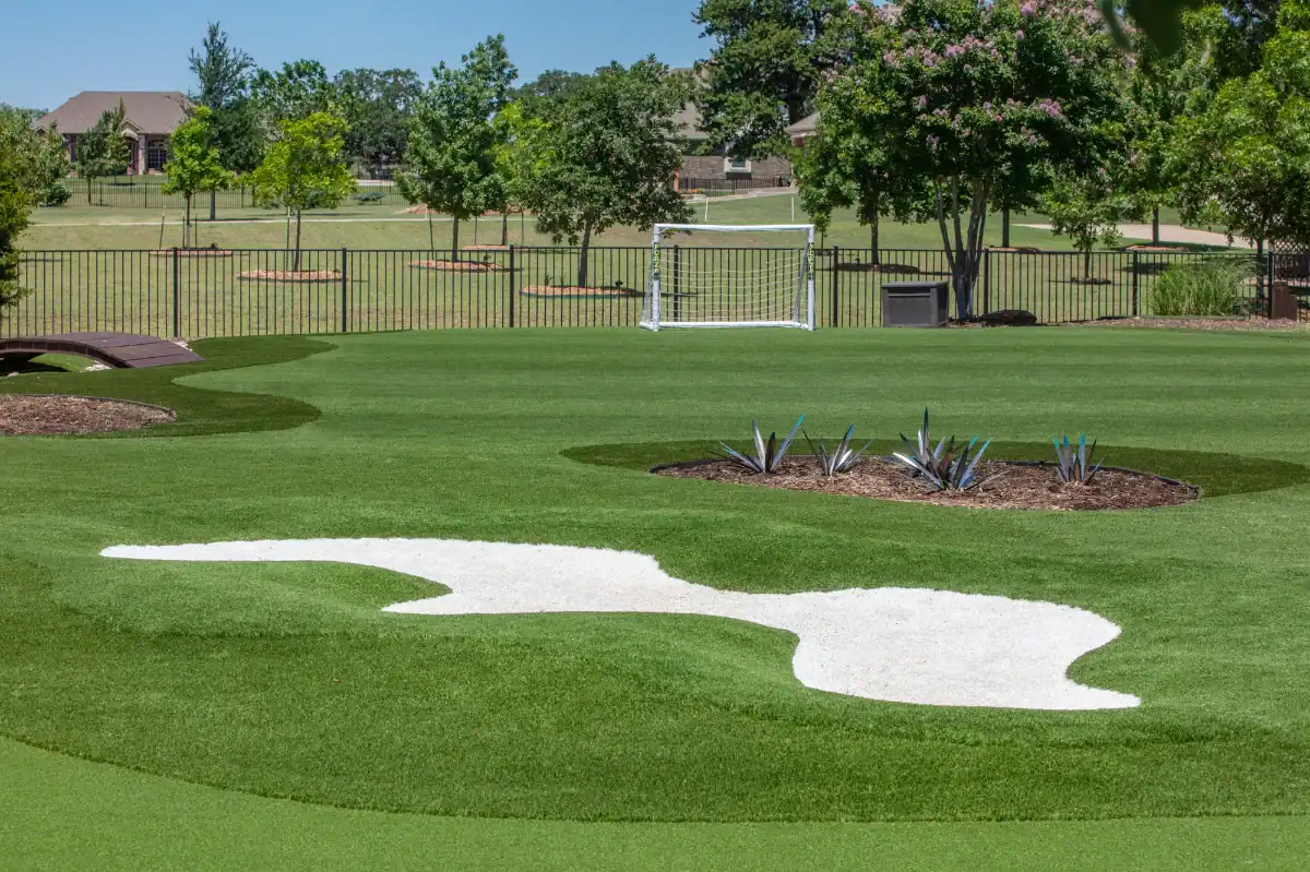 Putting Green in Grand Prairie Putting Green in Grand Prairie with a bunker and a soccer field