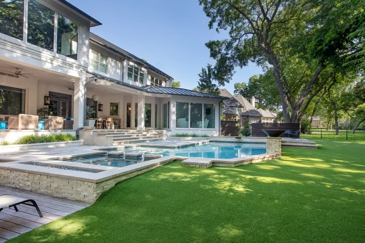 Artificial Grass Lawn in Grand Prairie Artificial Grass Lawn in Grand Prairie with a pool and large patio