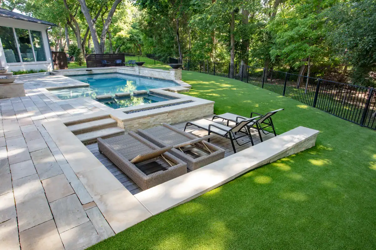 Pet Turf Yard in Garland Artificial Pet Turf Yard in Garland with a large pool and deck